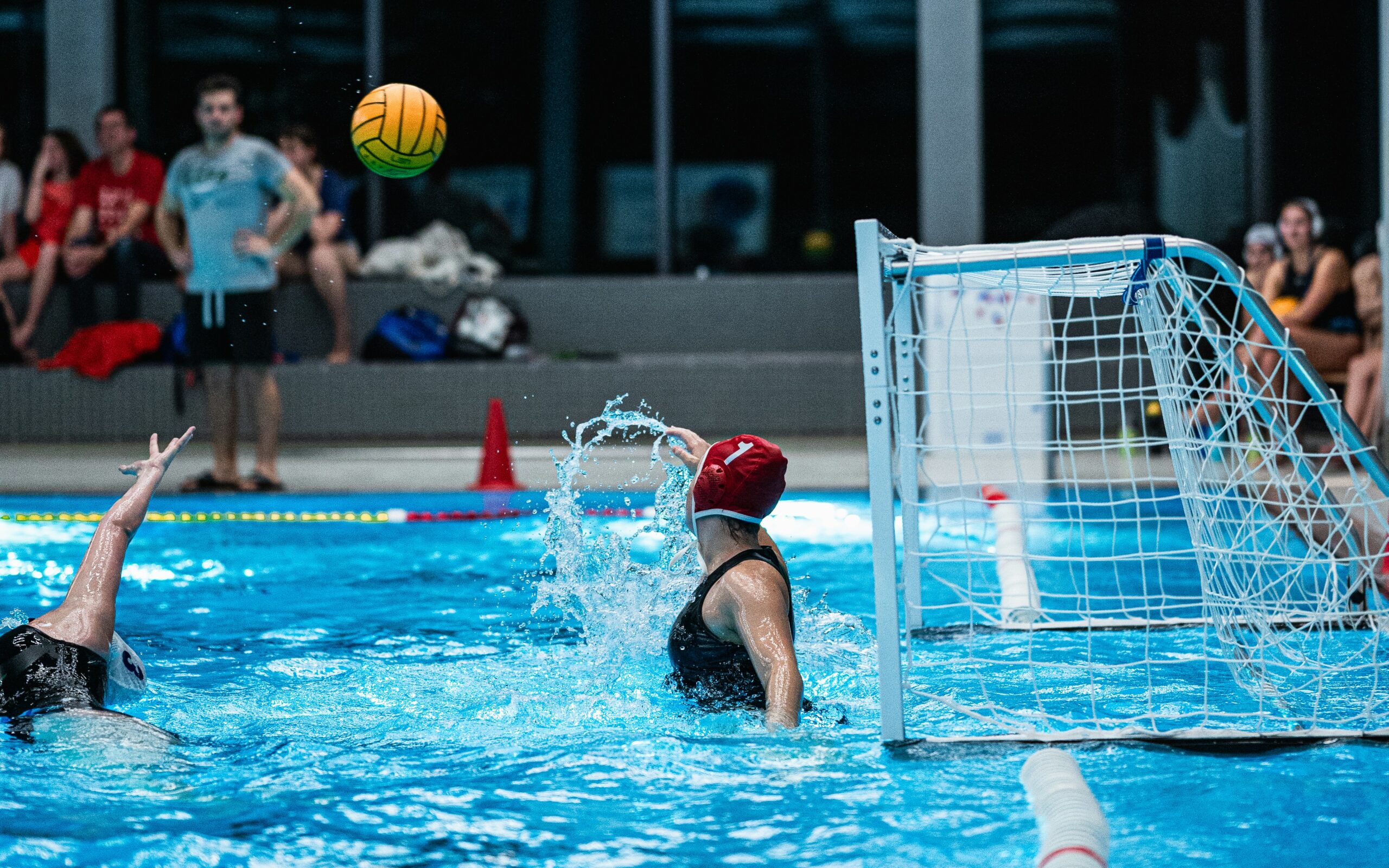 women playing water polo